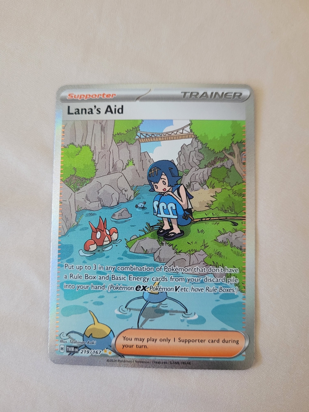 Lana's Aid Pokémon Trainer Supporter Card - Blue